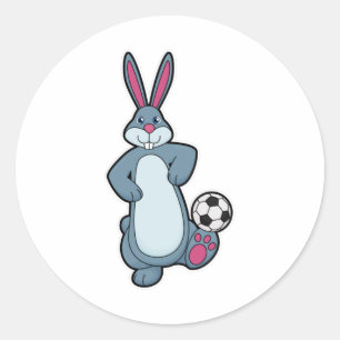 Sticker Rond Lapin comme joueur de football avec balle de footb