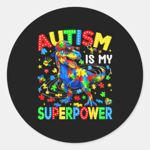 Sticker Rond L'autisme est superpuissance dinosaure t-rex autis