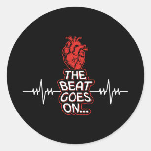 Sticker Rond Le Beat Commence À Porter Le Rouge Pour Les Défens