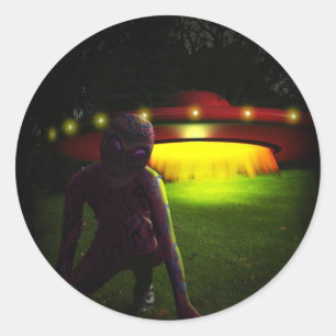 Sticker Rond Les aliens ont débarqué l'autocollant