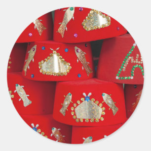 Sticker Rond Les Casquettes de Red Fez au marché
