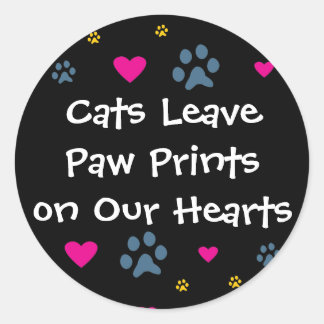 Sticker Rond Les chats laissent des Empreintes de pattes dans n
