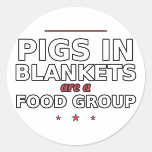 Sticker Rond Les cochons en couverture sont un groupe alimentai