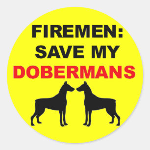 Sticker Rond Les pompiers sauvent mes Dobermans