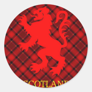 Sticker Rond Lion rouge écossais rampant sur Tartan