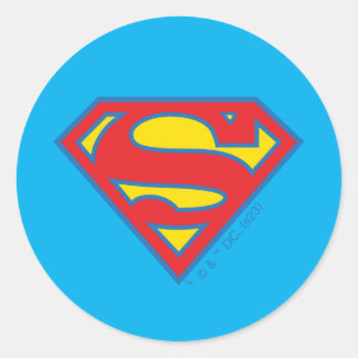 Sticker Rond Logo classique Supergirl avec fond bleu