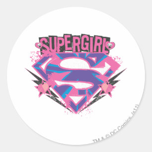 Sticker Rond Logo Supergirl rose et violet Grunge
