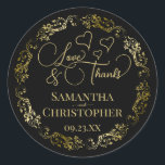 Sticker Rond Love & Merci Elegant Black & Gold Mariage<br><div class="desc">Ces beaux autocollants en noir et or sont conçus pour être utilisés comme étiquettes de faveur de mariage, ou comme scellés d'enveloppe pour vos cartes de remerciement de mariage. L'élégant design comporte une bordure dorée en dentelle ornée avec des lettres de script fantaisie "Amour & Merci!" Il y a des...</div>