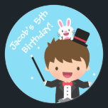 Sticker Rond Magician Boy Kids Magic Birthday Party<br><div class="desc">Stickers pour décorer votre spectacle magique fête d'anniversaire préférez les sacs et les cadeaux! Il a un petit garçon mignon dans un habit magicien de gilet en tailleur noir et cravate arc rouge avec une baguette magique dans la main. Il a un petit lapin blanc sur les cheveux à côté...</div>