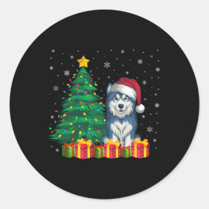 Sticker Rond Malamute alaskien laid Santa Hat lumières de Noël