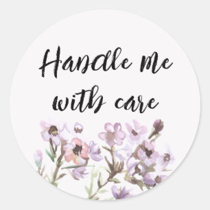 Sticker Rond Manipulez-moi avec soin - Fleurs violettes à l'aqu