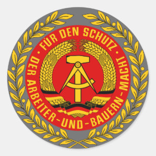 STICKER ROND MANTEAU DE NVA DES BRAS