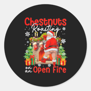 Sticker Rond Marrons rôtis sur un feu ouvert drôle de Père Noël
