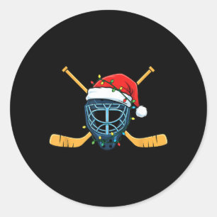 Sticker Rond Masque de hockey avec chapeau de Père Noël lumière