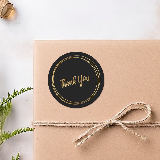 Sticker Rond Merci anneaux dorés noirs (Thank you gold rings black round sticker.)