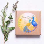 Sticker Rond Merci de Mariage indien de Peacock<br><div class="desc">Ajoutez une touche de finition royale à vos faveurs de mariage avec ce Peacock Floral Indian Mariage Merci Classic Round Sticker. Présentant une gracieuse paire de paons entourée de fleurs d'eau douce, ce design rayonne d'élégance et de tradition. Parfait pour sceller des ballotins, des enveloppes ou des bocaux sucrés, il...</div>