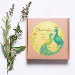 Sticker Rond Merci de Mariage indien de Peacock<br><div class="desc">Ajoutez une touche de finition royale à vos faveurs de mariage avec ce Peacock Floral Indian Mariage Merci Classic Round Sticker. Présentant une gracieuse paire de paons entourée de fleurs d'eau douce, ce design rayonne d'élégance et de tradition. Parfait pour sceller des ballotins, des enveloppes ou des bocaux sucrés, il...</div>