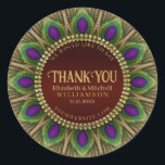 Sticker Rond Merci Mandala aux plumes de paon doré<br><div class="desc">Dessin audacieux et magnifique : Texte personnalisable avec un cercle de plumes de paon. Couleurs vertes et violettes superbes avec des garnitures dorées riches. | Ces détails et nom personnalisés décoratifs créent un design exceptionnel pour de nombreux événements spéciaux - entièrement personnalisable ♥ Cadeaux souvenirs de fiançailles / mariage (ou...</div>