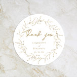 Sticker Rond Merci Mariage classique Gold Green<br><div class="desc">Voici notre Classic Gold Greenery Mariage Classic Round Sticker Design - méticuleusement conçu pour incarner une esthétique romantique moderne. Avec un mélange classique d'arrière - plans blancs propres et de feuilles dorés délicats, complétés gracieusement par un script de calligraphie simple associé à une police serif sobre. Le résultat est une...</div>