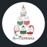Sticker Rond Merry Catmas Funny Christmas Kitten<br><div class="desc">Des chattes jouées dans un chapeau de Père Noël, un costume d'elfe, de laides chandails de Noël et plus encore. Ces chatons heureux et grincheux apporteront de la joie à chaque coin de vos vacances. Embrassez l'esprit de donner avec des autocollants sur le thème du chat mignon et amusants pour...</div>