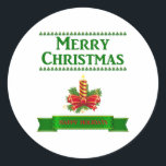 Sticker Rond Merry Christmas Candle (grn/rouge)<br><div class="desc">Bougie de Noël avec Joyeux Noël en vert écrit au-dessus de la bougie et bannière verte disant Joyeuses Fêtes en rouge ci-dessous.</div>