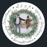 Sticker Rond  Merry Christmas Wreath Red Berries Name Photo<br><div class="desc">Merry Christmas Wreath Red Berries Name Photo Classic Round Sticker . These cute little stickers have Merry Christmas written in a pretty script font . These stickers can be customized by changing the family name and photo . Check out the other coordinating products in the collection . For any further...</div>