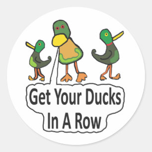 Sticker Rond Mettez Vos Canards Dans Une Rangée