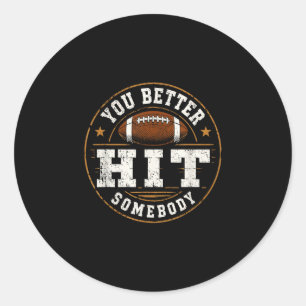 Sticker Rond Mieux vaut frapper quelqu'un drôle de football de 