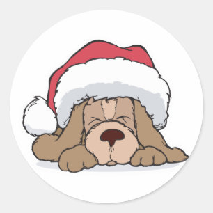 Sticker Rond mignon chiot en chapeau santa