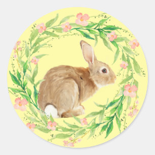 Sticker Rond Mignonne lapin de Pâques dans la couronne fleurie