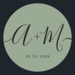 Sticker Rond Minimalist Monogram Script Custom green Wedding<br><div class="desc">Elevate your wedding details with the Minimalist Monogram Script Custom Wedding Date green Sticker. This elegant and personalized sticker adds a touch of sophistication to your wedding stationery, allowing you to showcase your monogram and wedding date in a simple yet impactful way. The sticker features a minimalist script design that...</div>