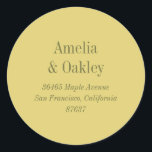 Sticker Rond Minimalist Yellow Elegant Wedding Return Address<br><div class="desc">This round wedding sticker features a soft yellow background with classic serif typography displaying the couple’s names and address. Designed to add a polished, cohesive touch to envelopes, favors, thank you notes, and wedding mailings. The soft yellow tone feels cheerful yet refined, pairing beautifully with modern and classic wedding palettes....</div>