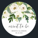 Sticker Rond Mint To Be Elegant Greenery White Floral Wedding<br><div class="desc">Floral wedding favor stickers with a top border featuring hand painted watercolor white roses and greenery with the message, "Mint to Be" in a lovely handwritten script and your names and date below. These elegant stickers perfect for a garden wedding in the summer and are a great way to add...</div>