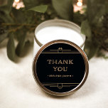 Sticker Rond Modern Deco | Elegant Black and Faux Gold Wedding<br><div class="desc">These glamorous wedding stickers feature a modern spin on classic art deco. Ornate,  faux gold look geometric borders and ornamentation decorate an elegant onyx black background for a dramatic,  vintage wedding look. Classic faux gold typography says "thank you",  making these perfect to add to your wedding favors.</div>