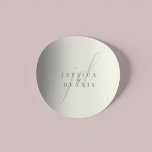 Sticker Rond Modern Minimal Elegant Script Monogram Wedding<br><div class="desc">Modern Minimal Elegant Script Monogram Wedding Classic Round Sticker Add a touch of elegance to your wedding with these modern, minimalist, and elegant script monogram classic round stickers. Crafted in classic ivory and storm dust colors, these stickers are perfect for sealing invitations, favor bags, or adding a personalized touch to...</div>