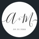 Sticker Rond Monogramme minimaliste Script Date de mariage pers<br><div class="desc">Élevez les détails de votre mariage avec l'autocollant de date de mariage personnalisé Monogramme minimaliste. Cet autocollant élégant et personnalisé ajoute une touche de sophistication à votre papeterie mariage, vous permettant de présenter votre monogramme et votre date mariage d'une manière simple mais impactée. L'autocollant présente une conception minimaliste de script...</div>