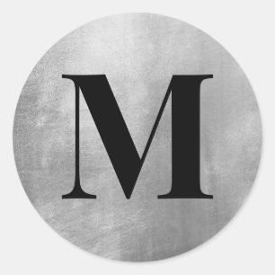 Sticker Rond Monogramme noir sur feuille de faux argent