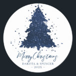 Sticker Rond Moody Merry Christmas | Classy Dark Navy Blue Tree<br><div class="desc">Tis the season to decorate and entertain! Modern, dark, and moody abstract holiday tree and hand-lettered "Merry Christmas" in with a rich, luxe palette. This elegant festive design features a whimsical sparkly Christmas tree with a frisky paint splatter enhanced with faux metallic glitter. For other colors or matching products, please...</div>