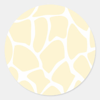 Sticker Rond Motif d'impression Giraffe en couleur crème.