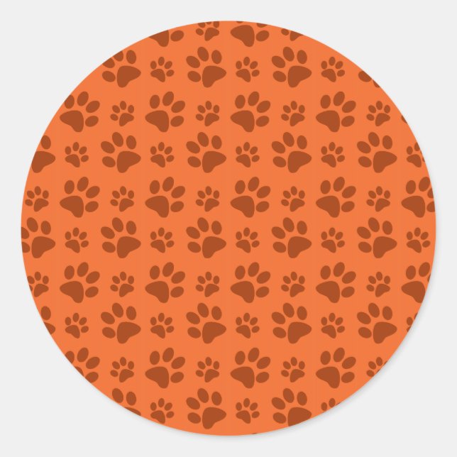 Sticker Rond Motif empreinte de patte de chien orange (Devant)