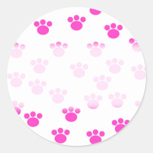 Sticker Rond Motif Empreinte de patte rose et blanc.