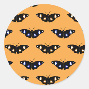 Sticker Rond Motif papillon sur arrière - plan orange