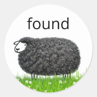 Mouton Noir Laineux Dans L'Herbe avec Texte "Trouv