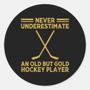Sticker Rond Ne sous-estimez jamais un vieux joueur de hockey s