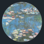 Sticker Rond Nénuphars de Claude Monet, Impressionnisme Vintage<br><div class="desc">Nénuphar (1914) de Claude Monet est une peinture de nature impressionniste vintage. Une des nombreuses variations de peintures florales de nénuphars que Monet peint par l'étang dans son jardin fleuri à Giverny, France. À propos de l'artiste : Claude Monet (1840-1926) est un fondateur du mouvement de peinture impressionniste française, dont...</div>