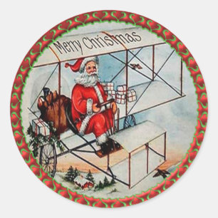 Sticker Rond Noël Père Noël pilotant un vieil avion