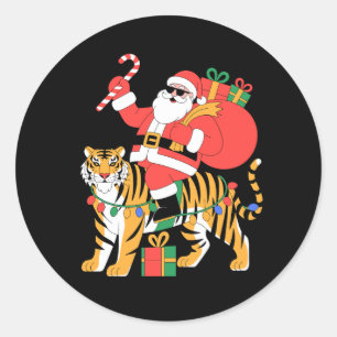 Sticker Rond Noël Santa sur un Tigre Canne à Sucre Xmas