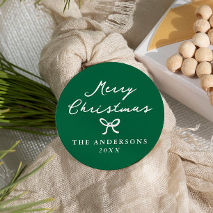 Sticker Rond Noël vert avec un nœud dessiné à la main de façon