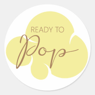 Sticker Rond Noyau de pop-corn jaune prêt à éclater