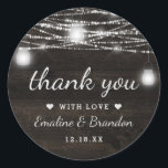 Sticker Rond Oak Ridge Rustic Dark Brown Mariage Merci<br><div class="desc">Oak Ridge Rustic Dark Brown Barn Wood, Sparkling Mason Jars, et Lights à cordes brillantes Conception avec des fils scintillants de lumières et jarres suspendues sur une texture de bois riche et profonde avec des accents blancs. Avec Des Polices De Script De Typographie Moderne. Un style rustique et élégant de...</div>